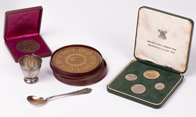 Lot 14 - A silver spoon and egg cup, a cased set of...