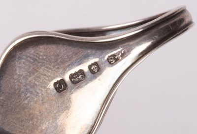 Lot 25 - An Edwardian silver medicine spoon, Levi &...