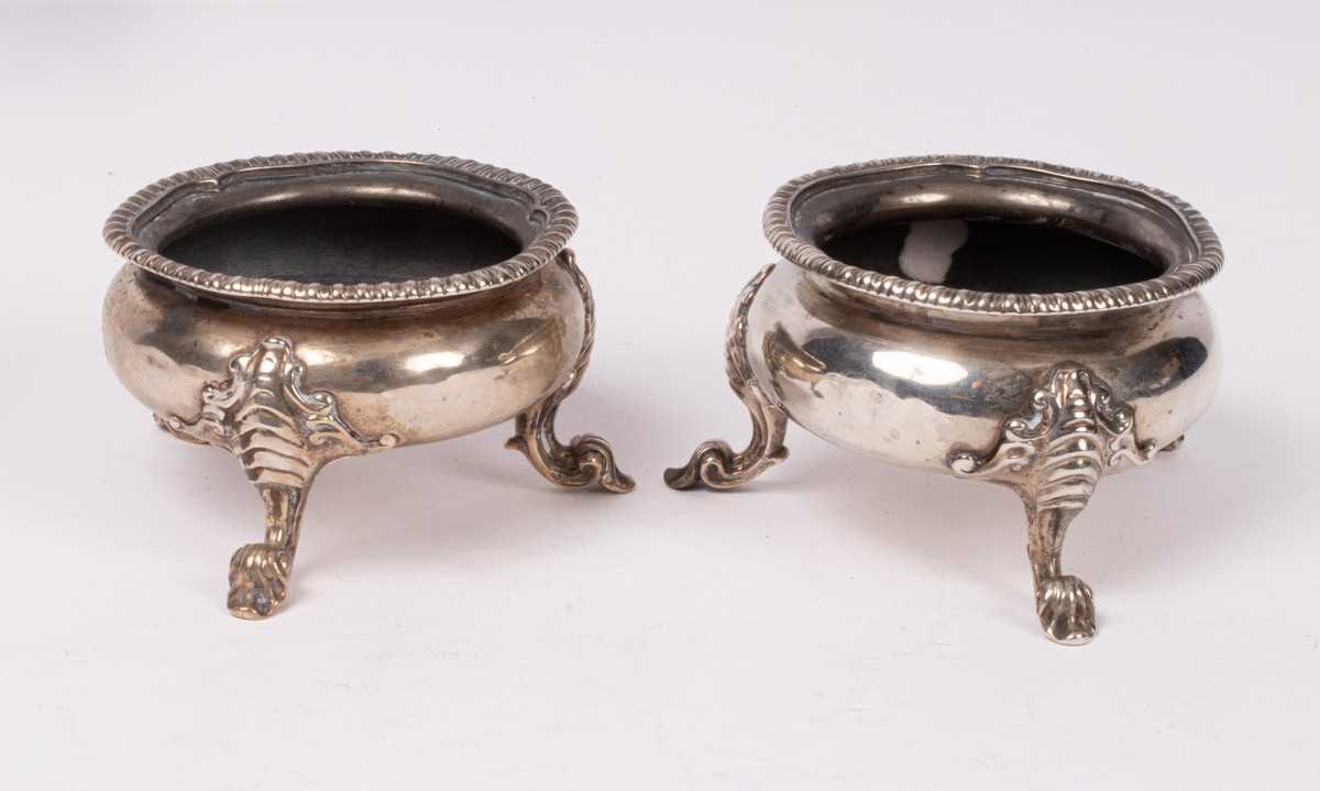 Lot 56 - A near pair of George III silver cauldron...