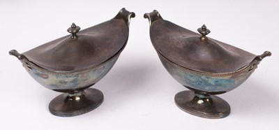 Lot 66 - A pair of George III silver sauce tureens and...