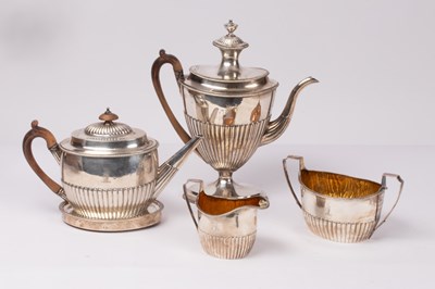 Lot 67 - A closely matched George III silver and silver...