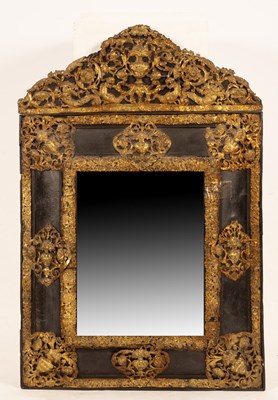 Lot 666 - A Flemish style wall mirror with embossed...