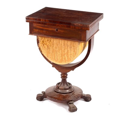 Lot 680 - An early Victorian mahogany work table with...