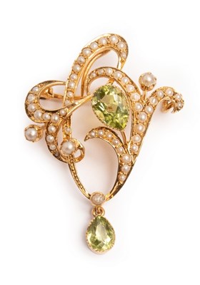 Lot 24 - An Art Nouveau peridot and seed pearl...