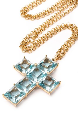 Lot 28 - A contemporary blue topaz cruciform pendant,...