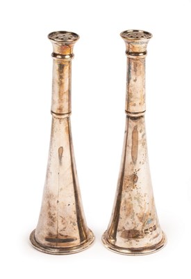 Lot 99 - A pair of novelty silver pepper pots, makers...