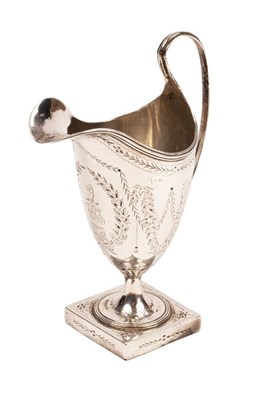 Lot 199 - A George III silver jug, Hester Bateman,...