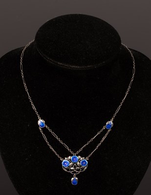 Lot 15 - An Art Nouveau silver and enamel pendant...