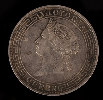 Lot 504 - A Hong Kong silver coin with '1866, One Dollar'...