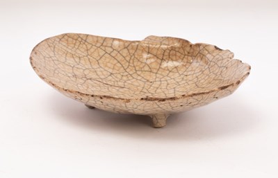 Lot 699 - A Chinese shell-shaped Ge type porcelain dish,...