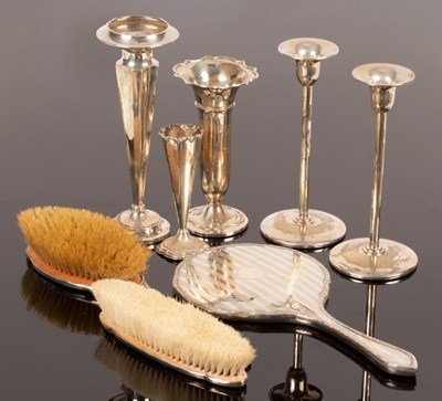 Lot 17 - A pair of silver candlesticks, CJH, Birmingham...