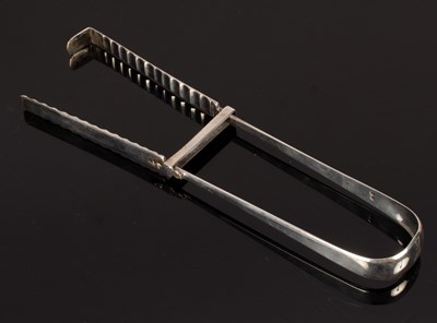 Lot 81 - A pair of George III silver asparagus servers,...