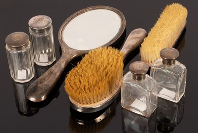 Lot 82 - A silver backed dressing table set, engraved...