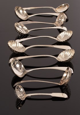 Lot 85 - Two pairs of George III silver sauce ladles...