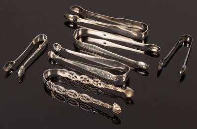 Lot 86 - Six pairs of silver sugar nips, Georgian and...