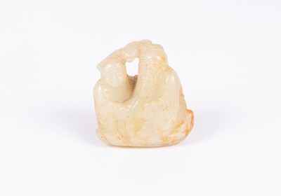Lot 26 - A Chinese jade carving of an old man and a boy