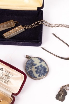 Lot 24 - A pair of novelty silver wishbone sugar nips
