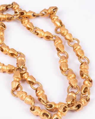 Lot 97 - A pair of Monet Smithsonian Collection yellow metal necklaces