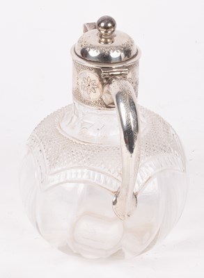 Lot 14 - A Victorian silver mounted claret jug