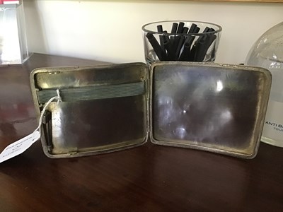 Lot 60 - A Middle Eastern white metal cigarette case