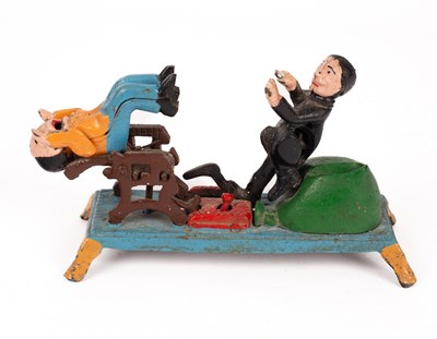 Lot 302 - A novelty cast iron mechanical money box