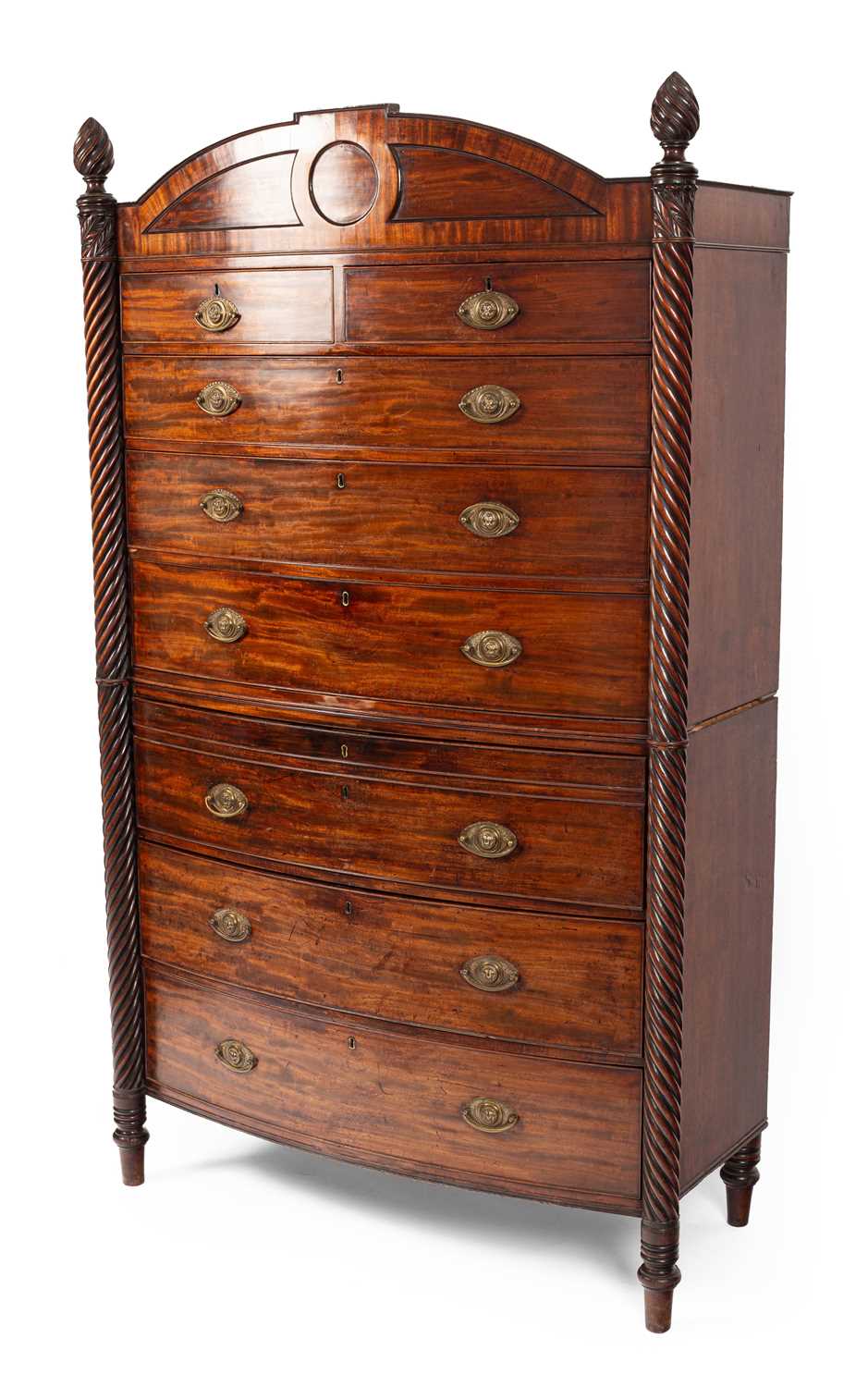 Lot 598 - A Regency mahogany bowfront secretaire chest on chest