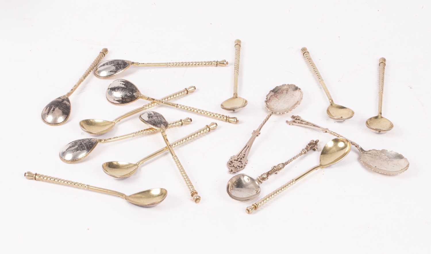 Lot 68 - A set of twelve Russian silver and niello spoons