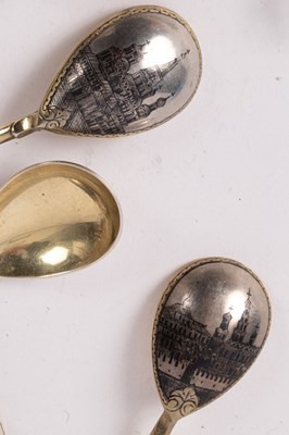 Lot 68 - A set of twelve Russian silver and niello spoons