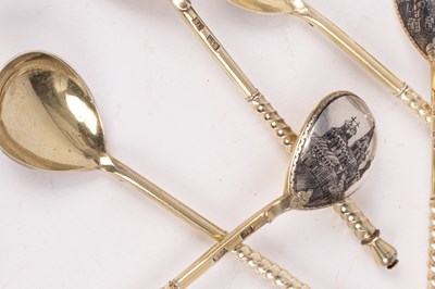 Lot 68 - A set of twelve Russian silver and niello spoons