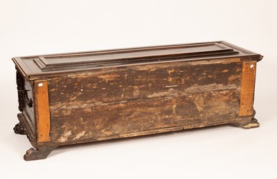 Lot 517 - A 17th Century Italian walnut carved and panelled cassone