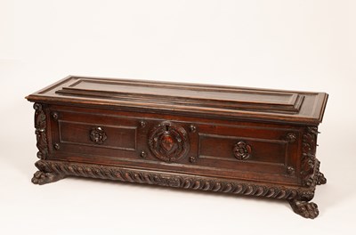 Lot 517 - A 17th Century Italian walnut carved and panelled cassone