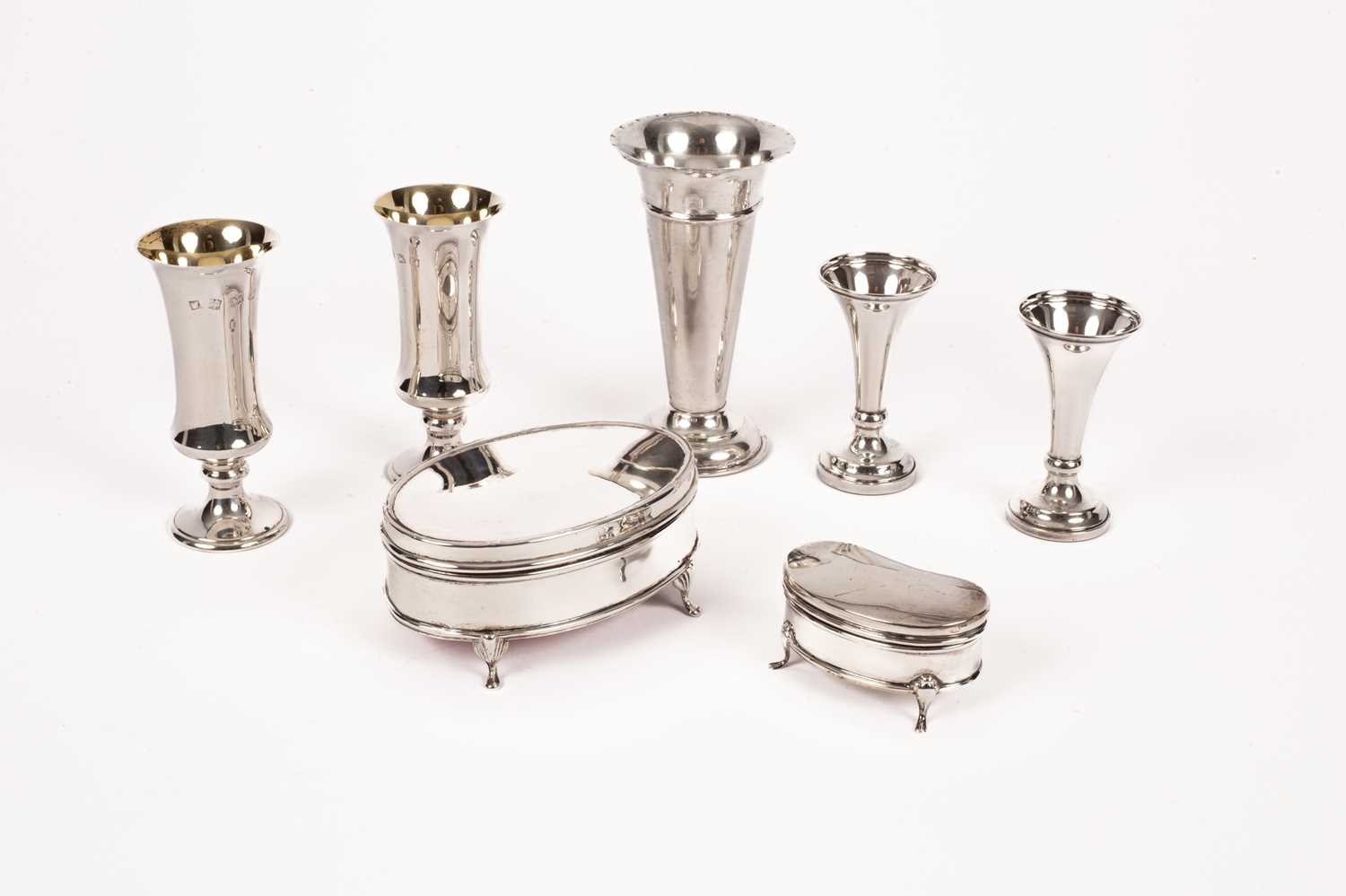 Lot 51 - A pair of silver and silver gilt vases