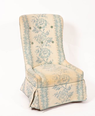 Lot 613 - A beech framed button back nursing chair