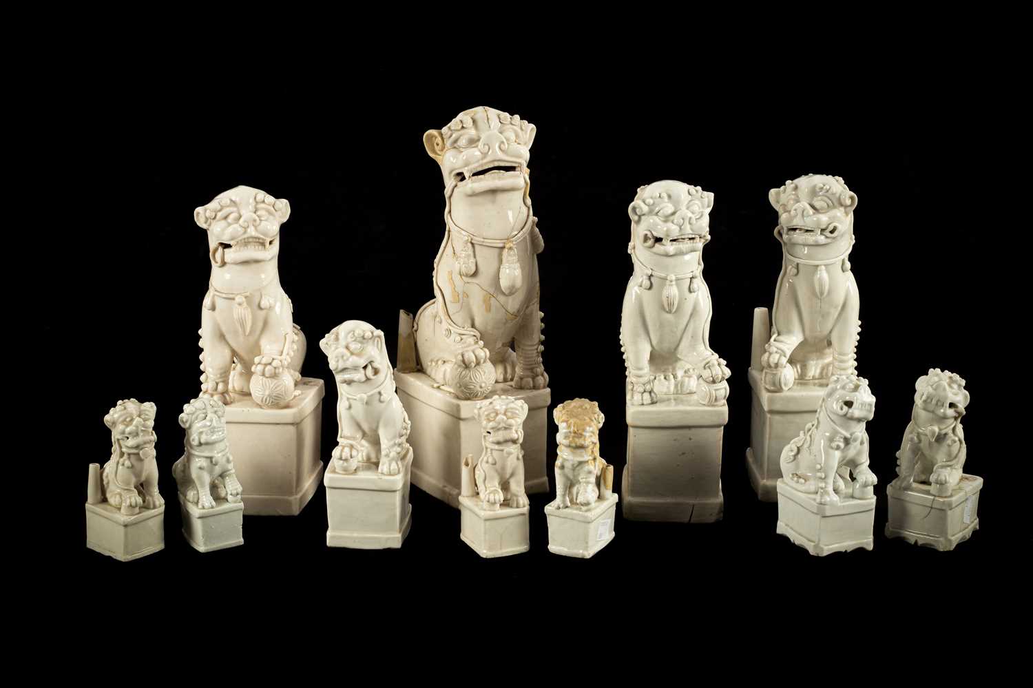 Lot 23 - A Chinese blanc de chine figure of a dog of Fo