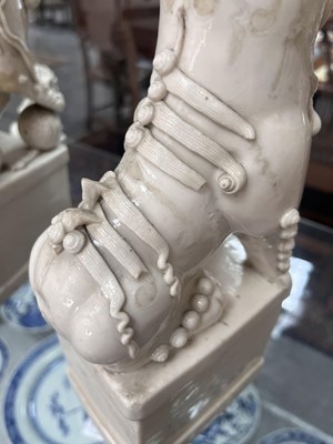 Lot 23 - A Chinese blanc de chine figure of a dog of Fo