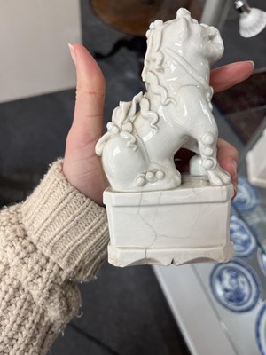 Lot 23 - A Chinese blanc de chine figure of a dog of Fo