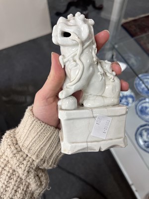 Lot 23 - A Chinese blanc de chine figure of a dog of Fo