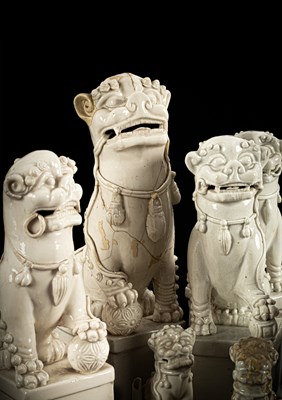 Lot 23 - A Chinese blanc de chine figure of a dog of Fo