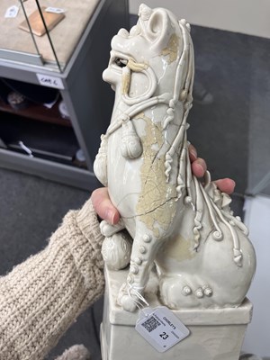 Lot 23 - A Chinese blanc de chine figure of a dog of Fo