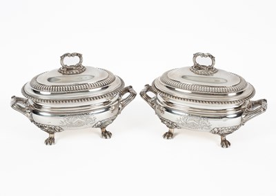Lot 15 - A pair of George III two-handled silver sauce tureens and covers
