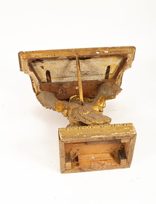 Lot 229 - A George II gilt gesso serpentine eagle console table