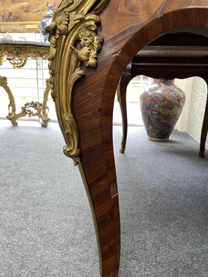 Lot 53 - A Victorian ormolu mounted tulipwood and kingwood desk in the Louis XV style