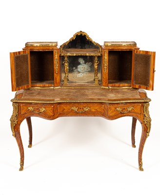 Lot 53 - A Victorian ormolu mounted tulipwood and kingwood desk in the Louis XV style