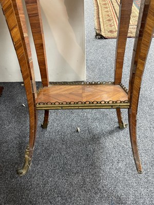 Lot 48 - A Louis XV style ormolu mounted kingwood and tulipwood two tier gueridon