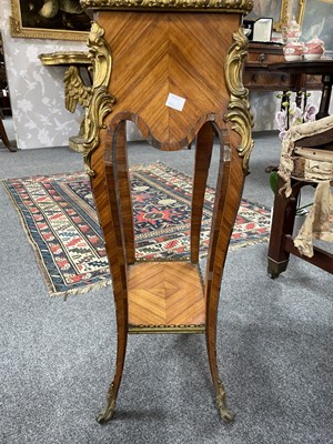 Lot 48 - A Louis XV style ormolu mounted kingwood and tulipwood two tier gueridon