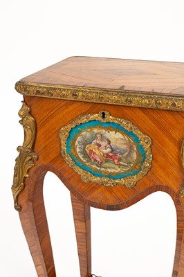 Lot 48 - A Louis XV style ormolu mounted kingwood and tulipwood two tier gueridon
