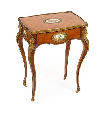 Lot 46 - A French gilt brass mounted kingwood and tulipwood centre table