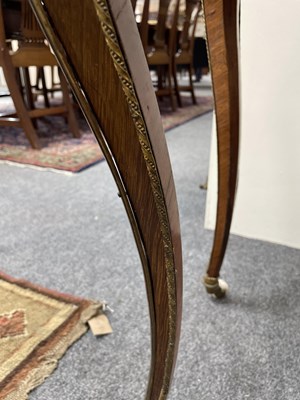 Lot 46 - A French gilt brass mounted kingwood and tulipwood centre table