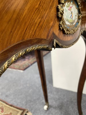 Lot 46 - A French gilt brass mounted kingwood and tulipwood centre table