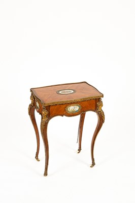 Lot 46 - A French gilt brass mounted kingwood and tulipwood centre table